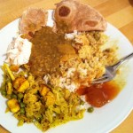 Indian dinner, counterclockwise from lower left: dry-fried cabbage & tofu, chutney, rice & chicken curry, chapati, Dal, carrot-raison raita 