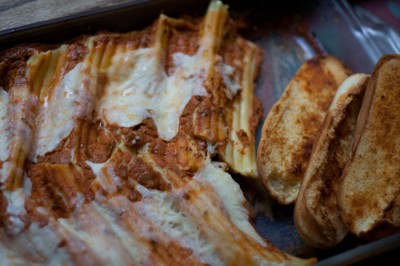 Manicotti with roasted vegetable sauce, and brat bun garlic toast
