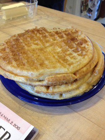 Stack of waffles - note glimpse of Feb. 23 New Yorker